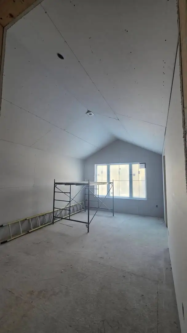 Drywall installation in a vaulted room